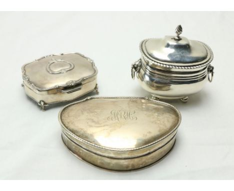 A Chester silver ogee shaped Sugar Box, c. 1907, with gadroon edge and hinged cover applied with two lion mask and ring handl