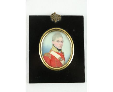 Frederick Buck (1772 - 1839)An oval Miniature Portrait, "Richard Ryan, Esq., wearing red military jacket with crest," on ivor