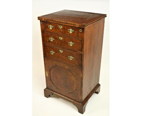 A very unusual crossbanded and figured walnut Chest Cupboard,&nbsp;mid-18th Century, with herring-bone banding and a fold out