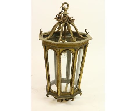 A very good and heavy 19th Century brass Hall Lantern, of tapering octagonal form with eight arched and glazed panels with ha
