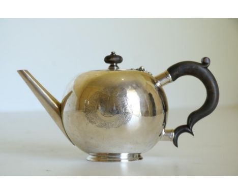 A fine quality and rare Irish Georgian (George II period) silver bullet Teapot,&nbsp;the hinged circular lid with mermaids en