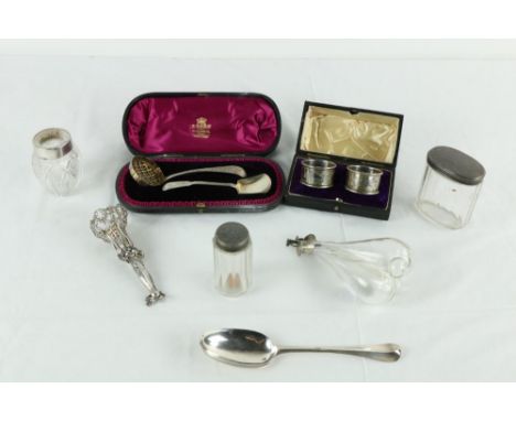 A cased Victorian silver Sugar Sifter Ladle, London 1848 &amp; a bright cut Caddy Shovel both cased together, a pair of cased