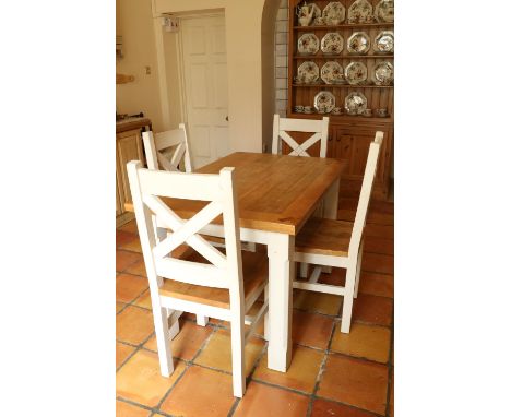 An oak and painted Kitchen Suite, comprising four heavy bracket type Chairs with X framed open backs, together with a rectang