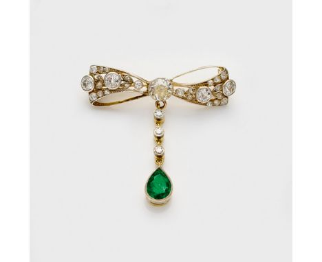 Jugendstil-Smaragd-Diamant-Schleifenbrosche Gelbgold, teilw. platiniert, gest. 585. Schauseitig ausgefasst mit Altschliffdiam
