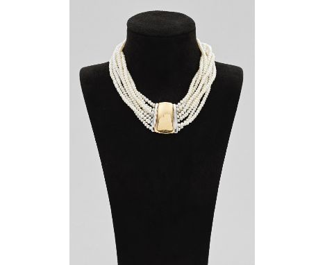 Collier de Chien von Johannes Hundt Gelb- und Weißgold, gest. 750. 7-reihige Kette aus weißen Boutonperlen in sehr farbintens
