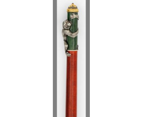 Spazierstock mit figürlichem Griff in der Art von Karl Fabergé. Nephrit, Silber, teilw. vergoldet und rot lasiertes Holz. Der