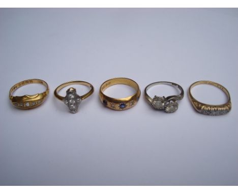 Four 18ct diamond set yellow gold rings and one platinum diamond set crossover ring, approx 1/2 carat each stone. 