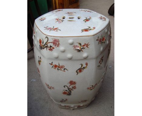 A ceramic garden seat, hexagonal form with crackle glaze finish and Chinese style floral design. 