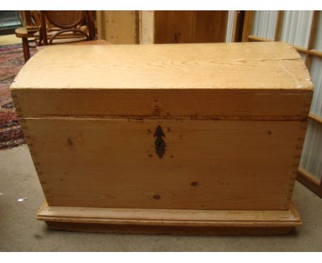 A 19th Century dome top pine trunk. 