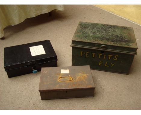 A small metal trunk including two deed boxes. 