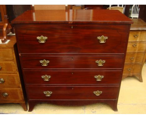 An early 19th Century mahogany secretaire chest, fitted drawer with fall front over three graduated drawers. 