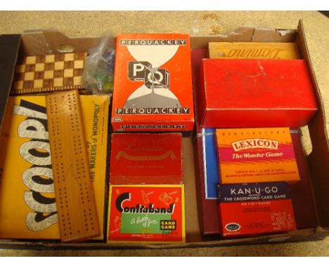 A box of games to include two chess sets, dominoes, cribbage etc. 