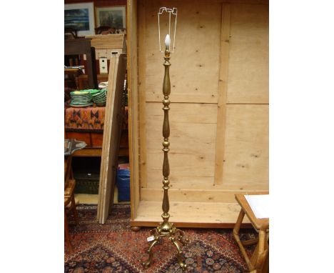 A heavy brass standard lamp. 
