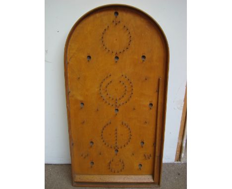 A tabletop Bagatelle board. 