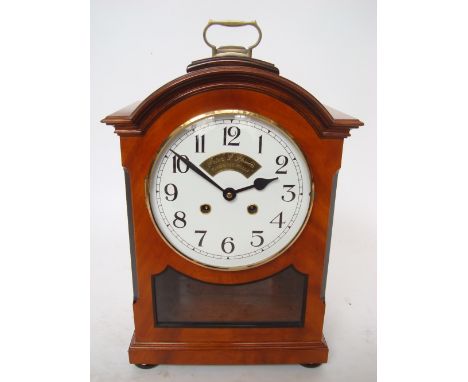 Peter Spicer: A George III style mahogany bracket clock, the circular white enamel dial with Arabic numerals and minute track