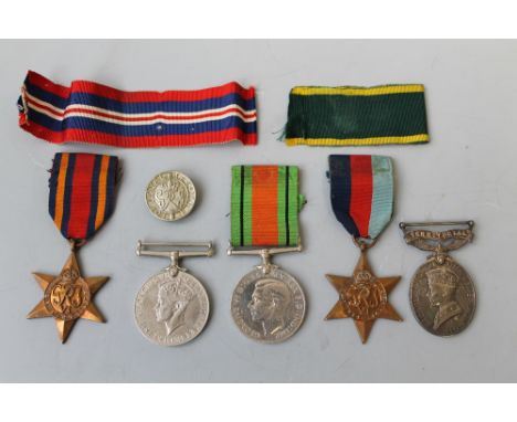 A GROUP OF FIVE MEDALS, 39-45 star, Burma star, defence, war and territorial efficiency medal, the first four unnamed as issu