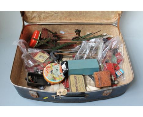 A SUITCASE OF ASSORTED MECCANO PARTS ETC., to include an aero engine Buyers - for shipping pricing on this lot, visit www.cut