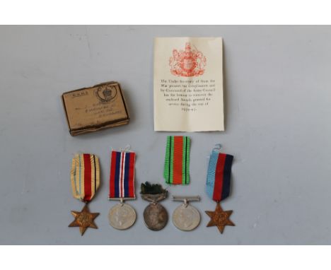 WWII MEDALS IN POSTAL BOX, to include 39-45 star, Africa star, defence medal and war medal, unnamed as issued, posted to 'S. 