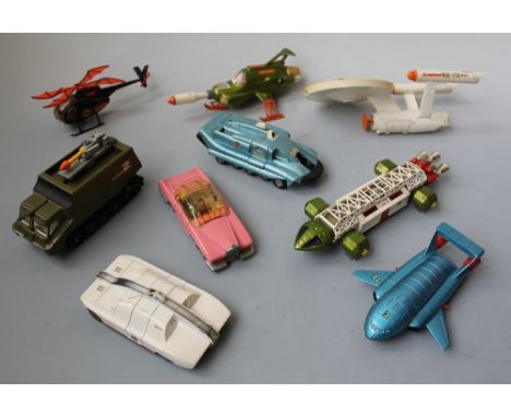 A TRAY OF TV RELATED DIECAST TOYS, to include a Space 1949 Eagle, UFO interceptor and Shado 2 tractor, Thunderbird 2 and FAB 