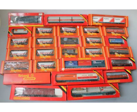 TWO TRAYS OF HORNBY 00 GAUGE ROLLING STOCK, consisting of hopper wagons, bogie wagons, box cans etc., all boxed Buyers - for 