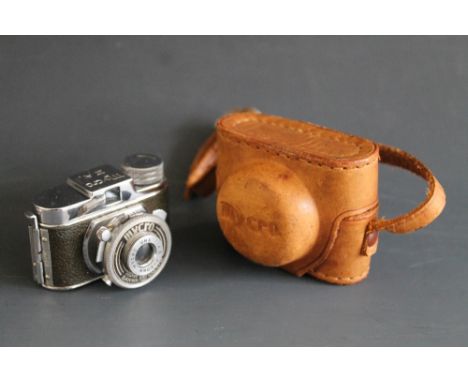 A 'MYCRO III A' MINIATURE CAMERA, in original leather case Buyers - for shipping pricing on this lot, visit www.cuttlestones.