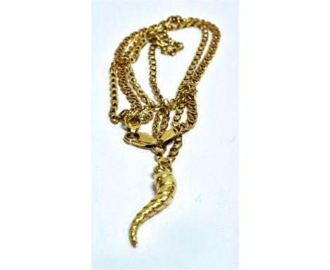 TWO VINTAGE GOLD BRACELETS JOINED AS MULTI-STRAND BRACELET and hung with a scrolling charm, the curb and oval link bracelets 