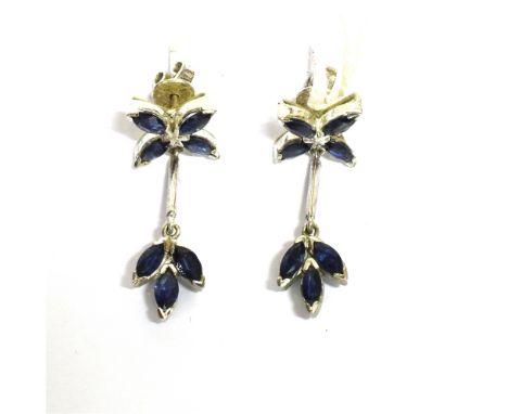 A PAIR OF 9CT GOLD, SAPPHIRE DIAMOND CLUSTER STUD EARRINGS AND A PAIR OF PENDENT EARRINGS the clusters each centred with a ti