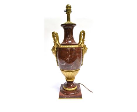 A FINE QUALITY GILT METAL MOUNTED MARBLE TABLE LAMP BASE  in Neo-Classical style, decorated with female masks, of amboyna sha