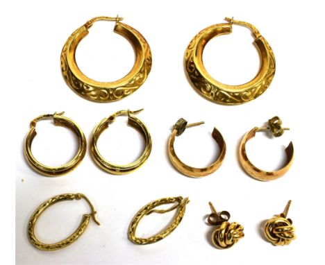 FOUR PAIRS OF VINTAGE 9CT GOLD HOOP EARRINGS AND A PAIR OF 'KNOT' STUDS various designs, dates and makers, 10.1g gross 