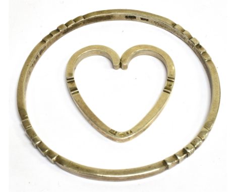 HARALD NIELSEN FOR GEORG JENSEN, AN OPEN HEART SHAPED KEY RING OR FOB with chased decoration at intervals, model 44, maker's 
