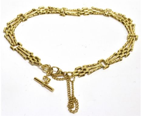 A VINTAGE 9CT GOLD FANCY THREE-BAR GATE BRACELET on a trigger clasp and hung with a small 'T' bar, marks indistinct, 5.6g 