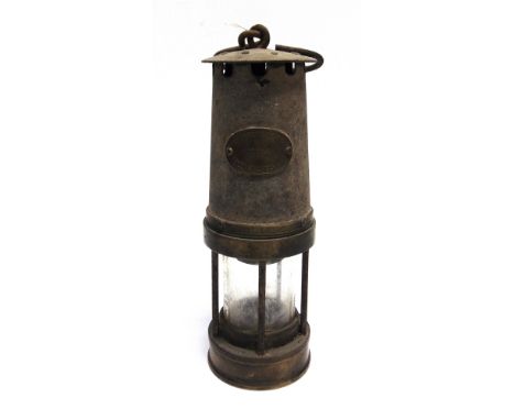 A MINER'S SAFETY LAMP  by Patterson Lamps Ltd of Felling-on-Tyne, with an applied brass plaque impressed 'G.P.O.' and numbere
