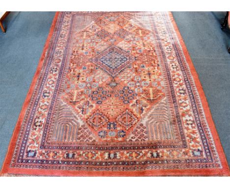 A RED GROUND CARPET 197cm x 300cm