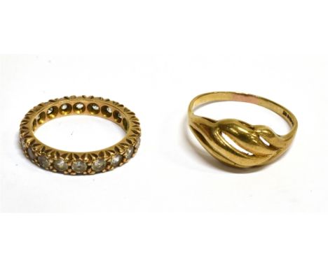 A VINTAGE 9CT GOLD OPEN SPIRAL-FLUTED RING AND A PASTE ETERNITY RING the spiral ring London 1986, size S+, 2.3g; the eternity