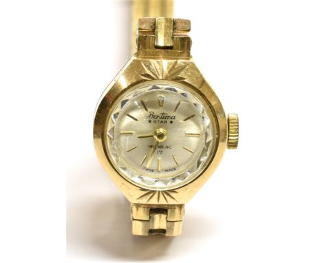 BERTINA, STAR, A LADY'S 9CT GOLD SMALL ROUND BRACELET WATCH, CIRCA 1965  brushed-silvered dial with raised baton indicators a