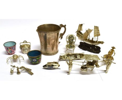 A COLLECTION OF MISCELLANEOUS FAR EASTERN SILVER AND WHITE METAL ORNAMENTS including a tapering mug with a stylised fish hand