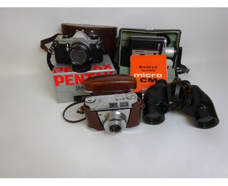 Sankyo Super Micro CM video camera, Pentax MG No. 7085128 35mm camera, a Kodak Retinette 1A camera in leather case & a pair o