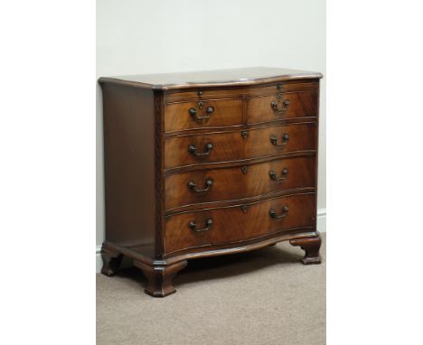 Early 20th century mahogany and walnut banded serpentine chest, two short and three long graduating drawers with brushing sli