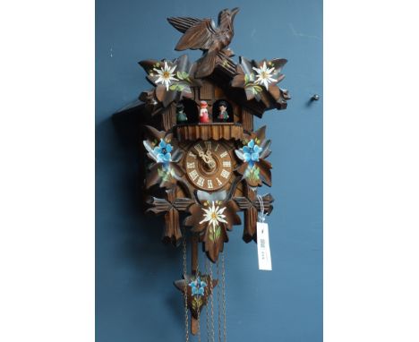 Black Forest style carved wood and painted cuckoo clock, H38cm CLOCKS & BAROMETERS - as we are not a retailer, these items ar