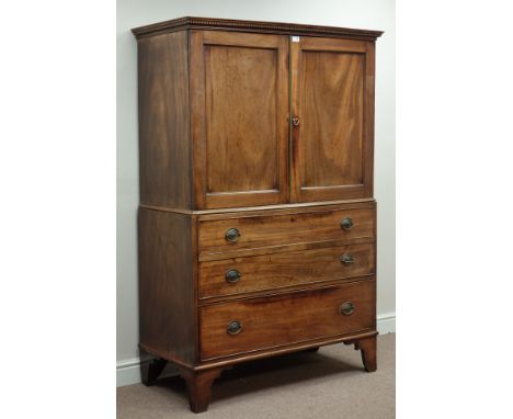 George III mahogany linen press, two panelled doors above two false and one long drawer, dentil cornice and bracket feet, W11