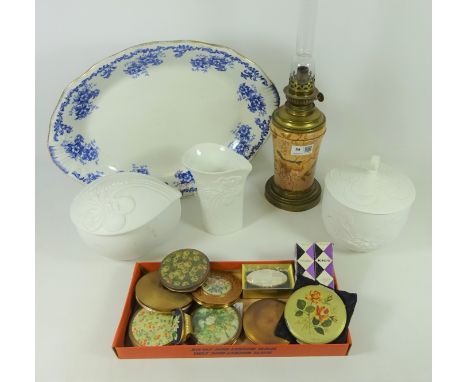Early 20th Century French porcelain oil lamp, three pieces of Kaiser pottery, compacts etc in one box    Condition Report   C