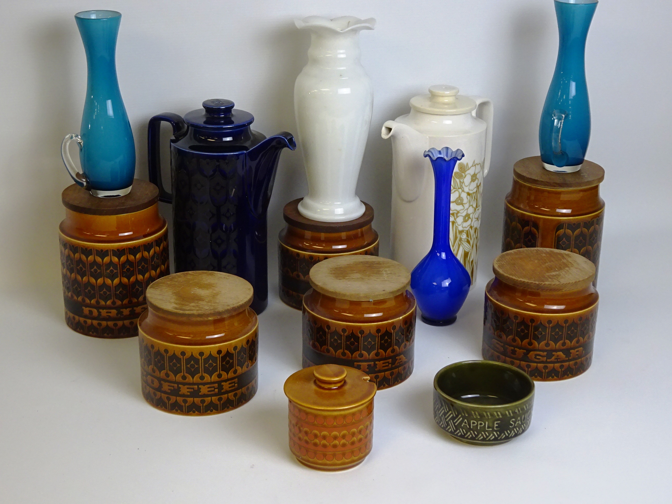 Hornsea pottery storage jars and two coffee pots, coloured glassware etc in one box Condition R