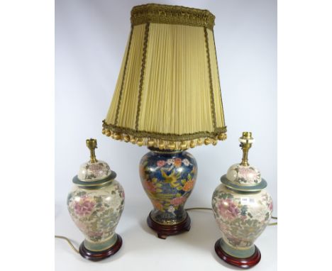 Pair of oriental stye table lamps and a large Chinese gilded table lamp (3)   Condition Report   Click here for further image