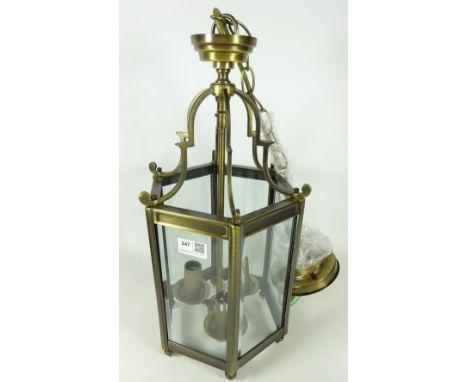 Glass and brass finish hexagonal hall lantern with three light fittings, as new     Condition Report   Click here for further