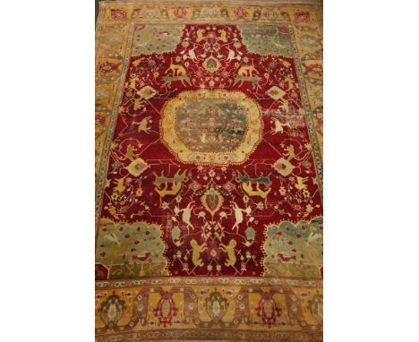 Antique Persian maroon ground hunting rug carpet, mustard boarder, central medallion, decorated with animals and birds, 405cm