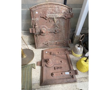 TWO VINTAGE CAST IRON BOILER DOORS