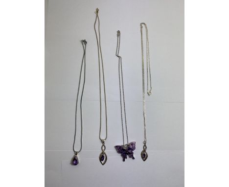 FOUR MARKED SILVER NECKLACES WITH AMETHYST PENDANTS