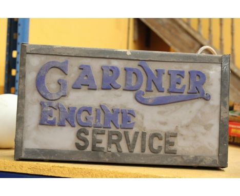 A GARDNER ENGINE SERVICE ILLUMINATED SIGN