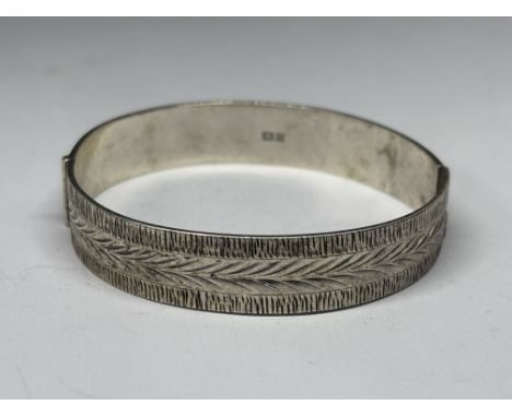 A HALLMARKED BIRMINGHAM SILVER BANGLE