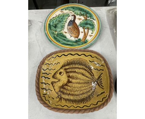 A HAND PAINTED CERAMIC PLATE FEATURING A PARTRIDGE IN A NAUTRAL SETTING TOGETHER WITH A FURTHER SERVING BOWL
